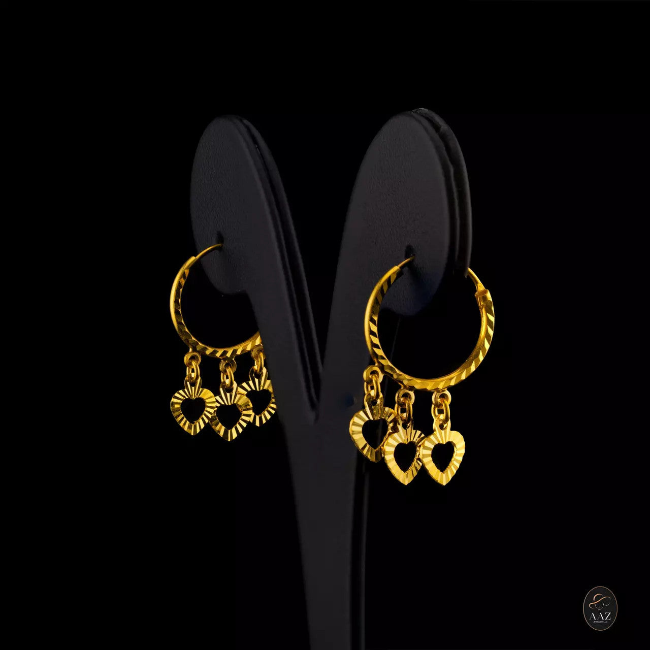 Three Hearts 22K Gold Hoop Earrings left