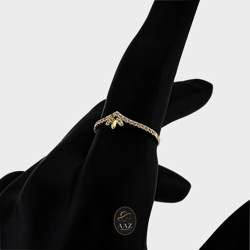 Chevron 18k Gold with Zircon Stones Ring on an index finger