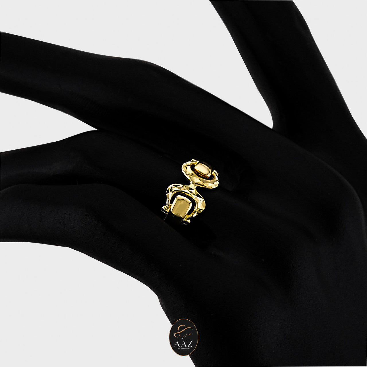 Buckle 18K Ring on a left angle