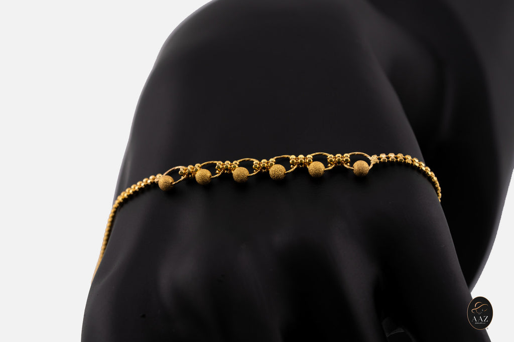 Sleek 21K Gold Bracelet hand middle angle