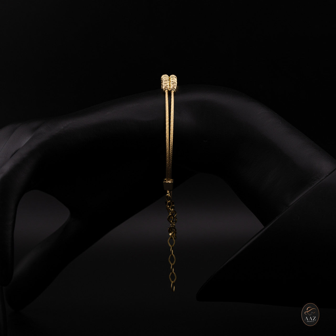 Dual Band 18k Gold Plated Silver Bangle from a side angle