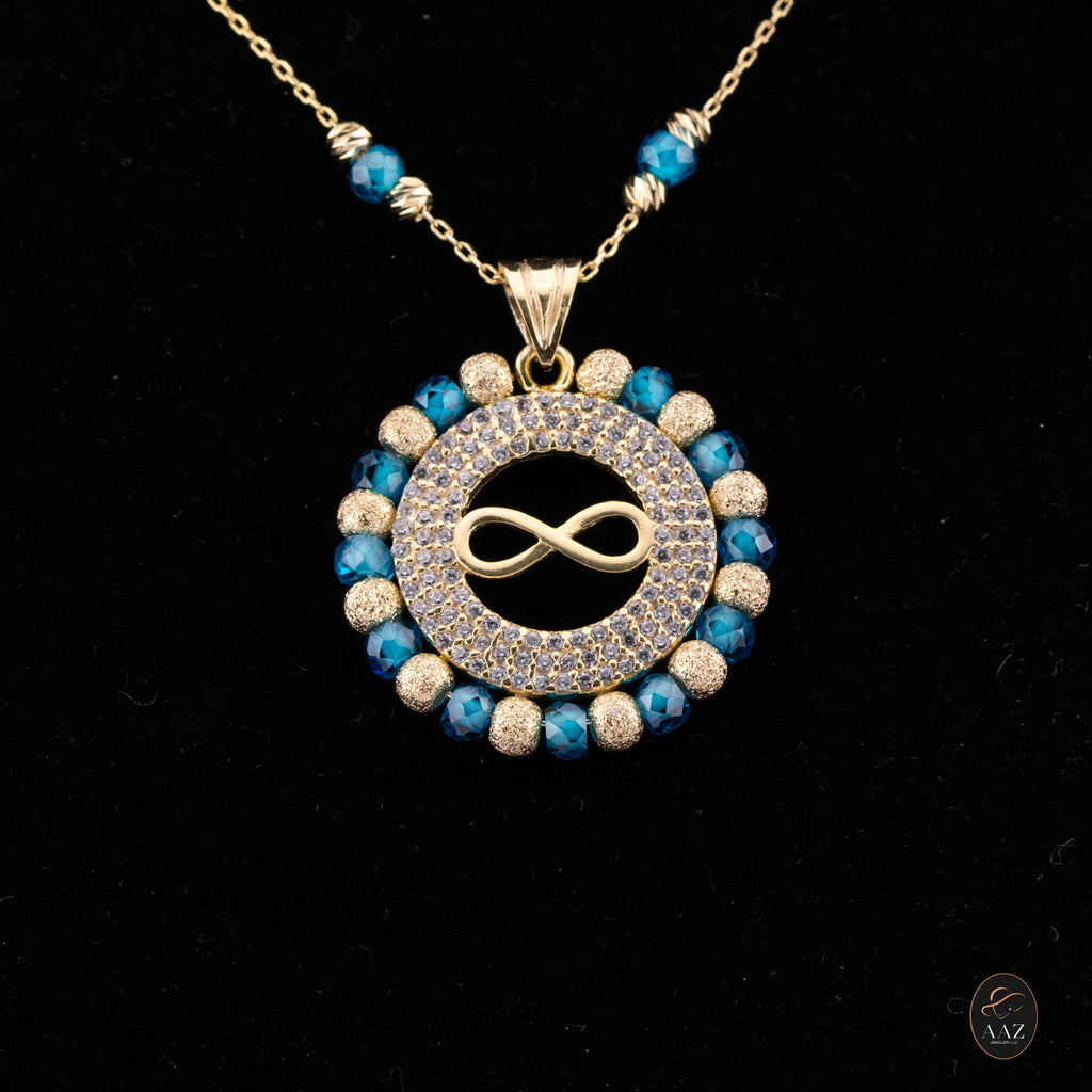 Blue Infinity 18k Gold Plated Silver Necklace on a model