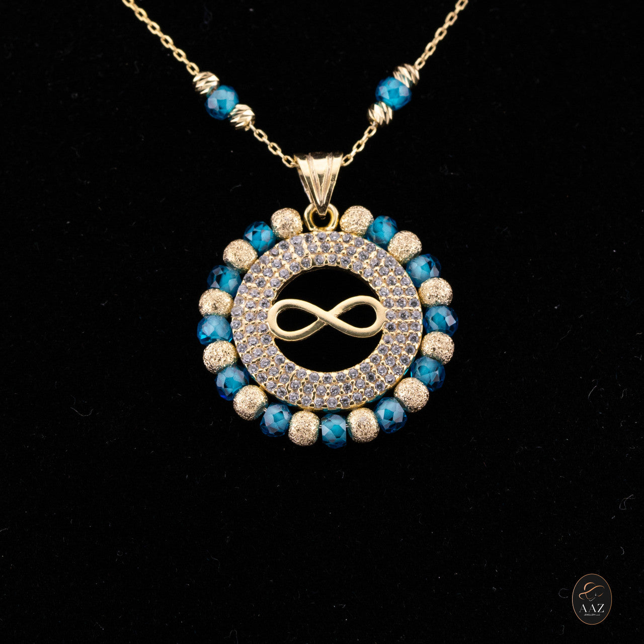 Blue Infinity 18k Gold Plated Silver Necklace on a model