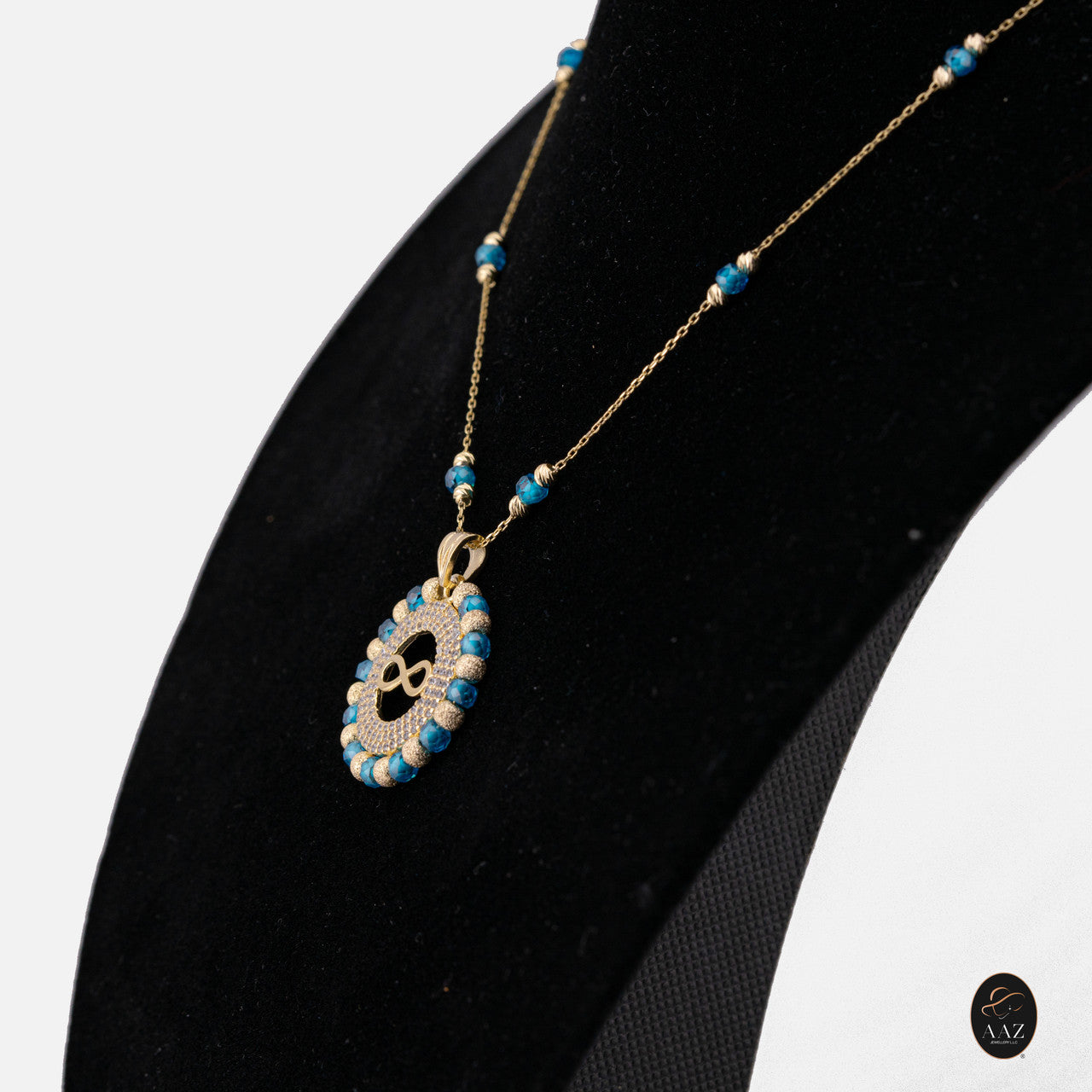 Blue Infinity 18k Gold Plated Silver Necklace from a right angle