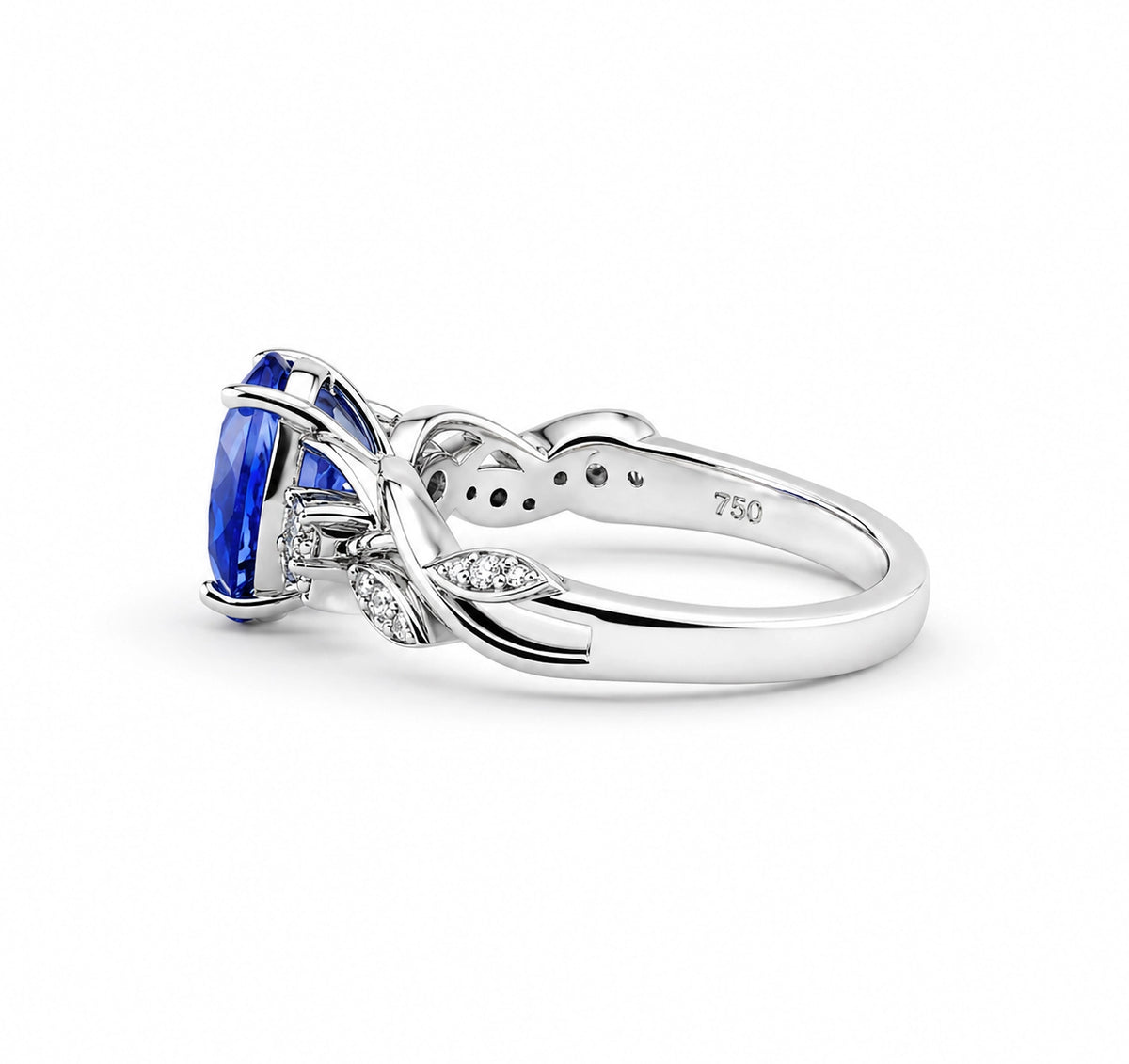 Floral tanzanite ring, side view showing the 750 stamp inside the band
