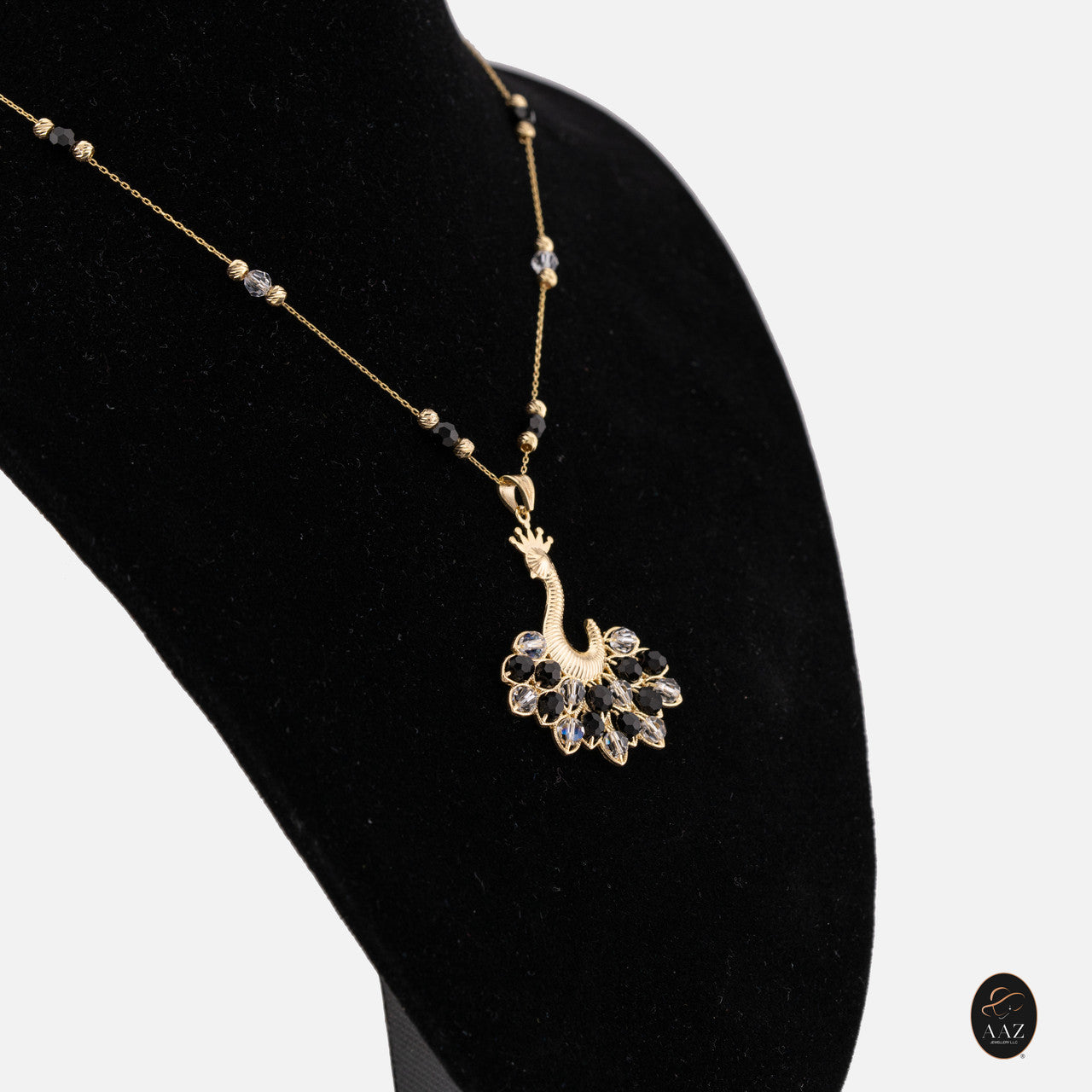 Black/White Queen Peacock 18k Gold Plated Silver Necklace from a left angle