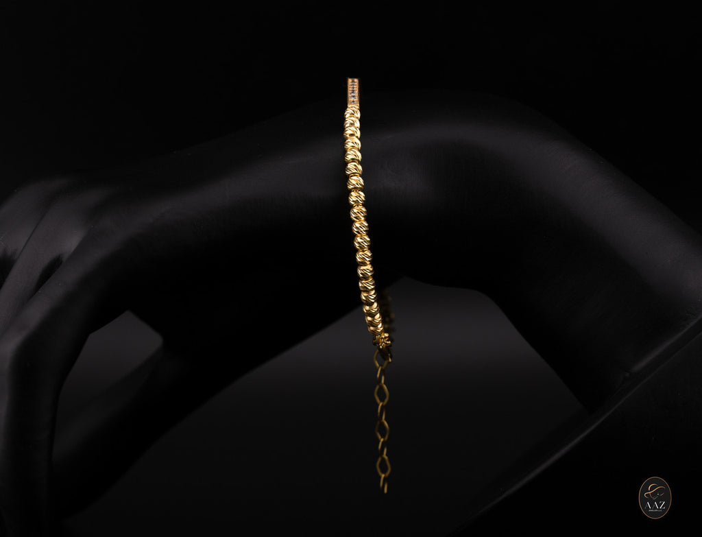Bar 18k Gold Plated Silver Bangle from a left angle